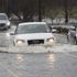 Heavy rain batters parts of the UK bringing flooding and travel misery