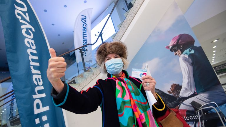EDITORIAL USE ONLY Wendy Milbank, aged 75, from Newmarket, after receiving the Oxford/Astrazeneca vaccine at the opening of a Pharmacy2U Covid-19 vaccination centre, at the Newmarket Racecourse, Suffolk. Picture date: Saturday January 30, 2021.