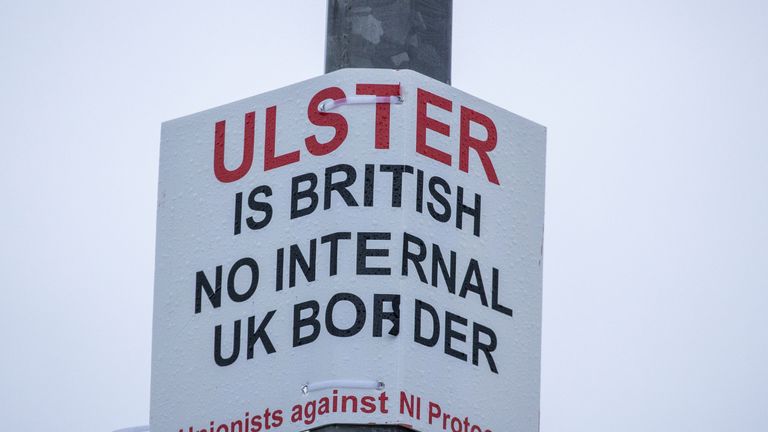 A sign on a lamppost that reads 'Ulster is British - no internal UK Border - Unionists against NI Protocol', opposite the Department of Agriculture, Environment and Rural Affairs (DAERA) Redlands site. It will be used to inspect animal products travelling from Great Britain into Northern Ireland after the post-Brexit transition period at the end of the year.