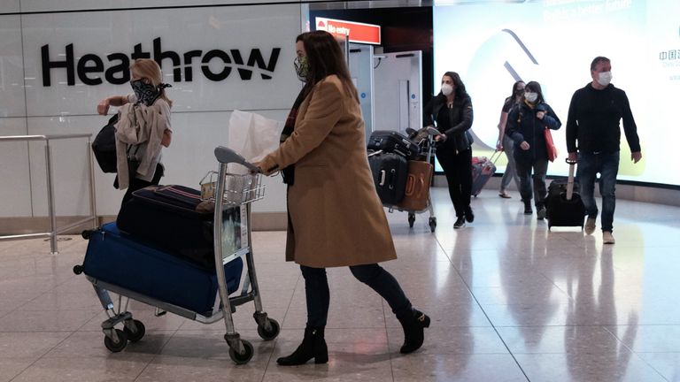 Passengers arrive back in the UK at Heathrow Terminal 2 International arrivals, during England&#39;s third national lockdown to curb the spread of coronavirus. Picture date: Friday January 29, 2021.