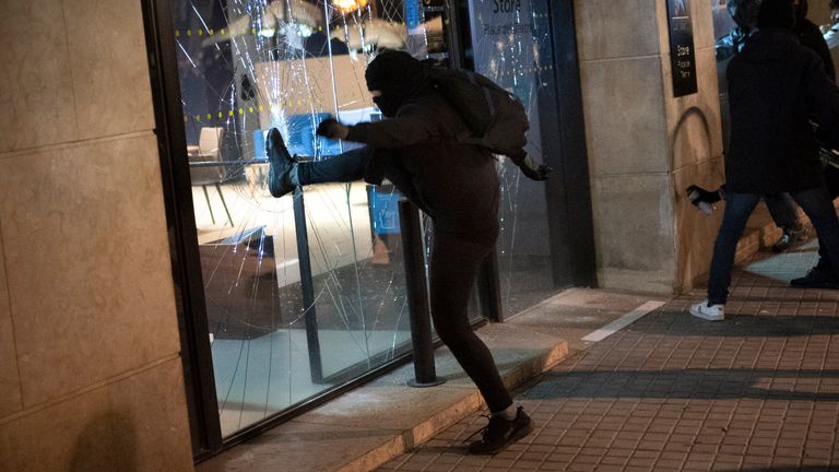 Arrests were made after bank windows were smashed