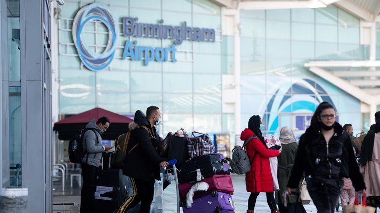 Passengers are escorted to quarantine hotels at Birmingham Airport. File pic