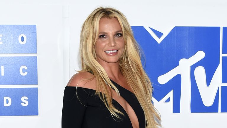 FILE - In this Aug. 28, 2016 file photo, Britney Spears arrives at the MTV Video Music Awards in New York. Los Angeles court records show Spears and her caretakers settled a long-running libel and breach-of-contract lawsuit on Friday, Sept. 2, 2016, that was filed by her former confidante Sam Lutfi against the pop singer and her parents. (Photo by Evan Agostini/Invision/AP, File)