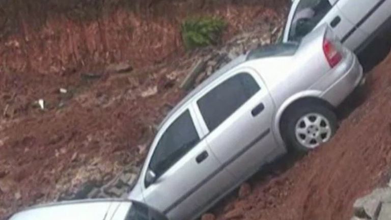 Cars fall into pit in Turkey as car park wall collapses