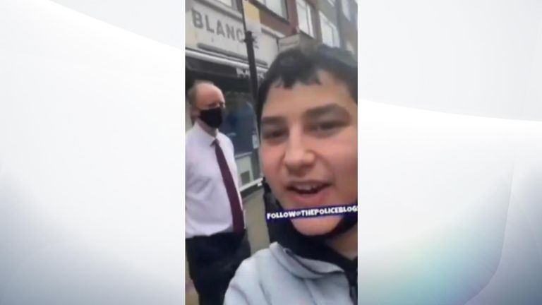 A maskless youth filmed himself harassing Professor Chris Whitty in the street. Pic: Twitter/Matt_VickersMP