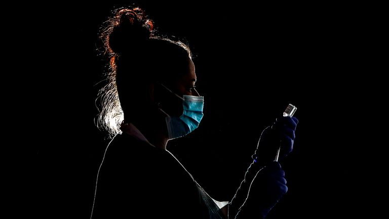 A nurse prepares the Oxford/AstraZeneca vaccine in Wales. File pic: AP