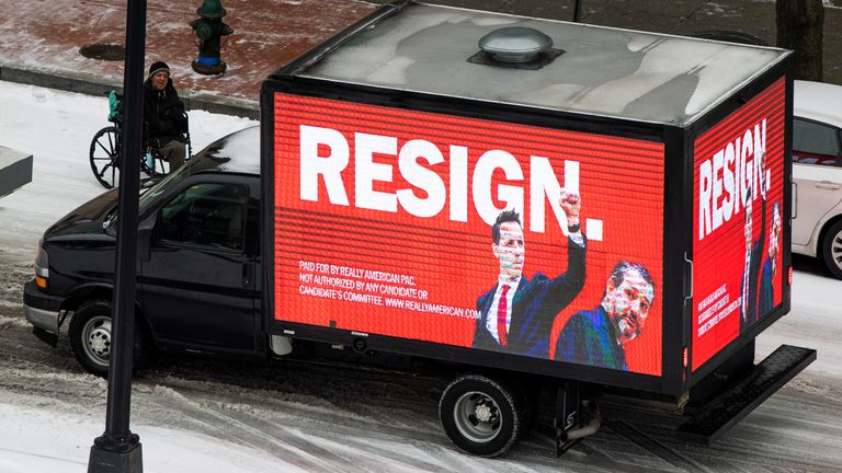 UNITED STATES - FEBRUARY 18: A truck with a sign paid for by Really American PAC to encourage Sens. Josh Hawley, R-Mo., and Ted Cruz, R-Texas, to resign, is seen on P Street NE, in the NoMa neighborhood as a winter storm moved though the Washington, D.C., area on Thursday, February 18, 2021. (Photo By Tom Williams/CQ Roll Call).    