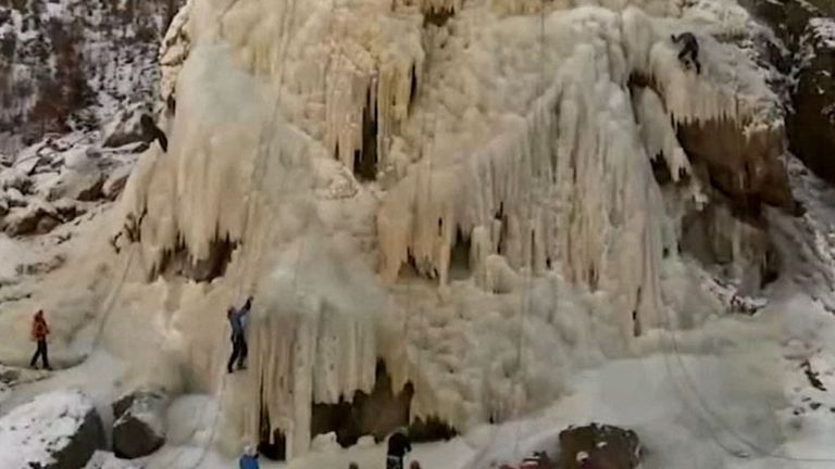 Climbers embrace a manufactured ice slope challenge in the Czech Republic