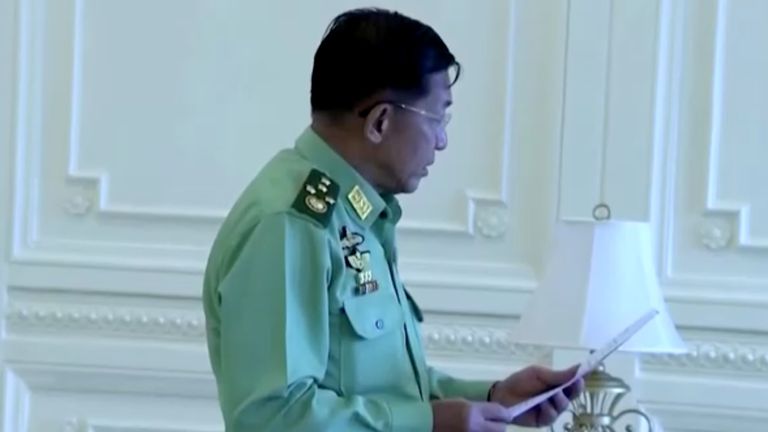 A screen grab from Myanmar state television footage, broadcast on February 1, 2021, shows General Min Aung Hlaing reading a statement during a meeting with Myanmar Acting President Myint Swe (not pictured). MRTV/Handout via REUTERS THIS IMAGE HAS BEEN SUPPLIED BY A THIRD PARTY. MYANMAR OUT. NO COMMERCIAL OR EDITORIAL SALES IN MYANMAR. NO RESALES. NO ARCHIVES