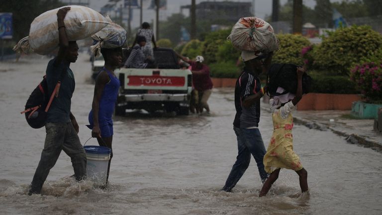 A flooded street in Haiti during Tropical Storm Laura