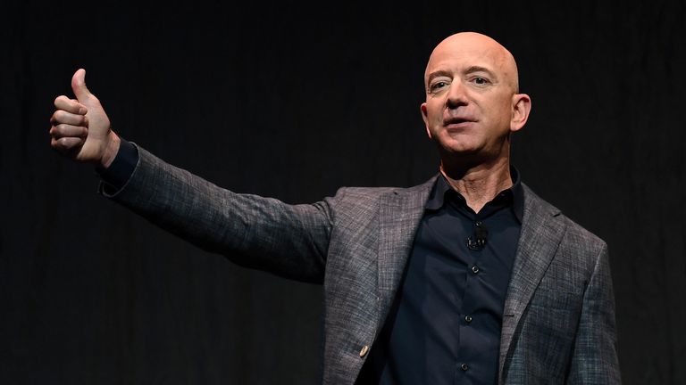 Founder, Chairman, CEO and President of Amazon Jeff Bezos gives a thumbs up as he speaks during an event about Blue Origin&#39;s space exploration plans in Washington, U.S., May 9, 2019
