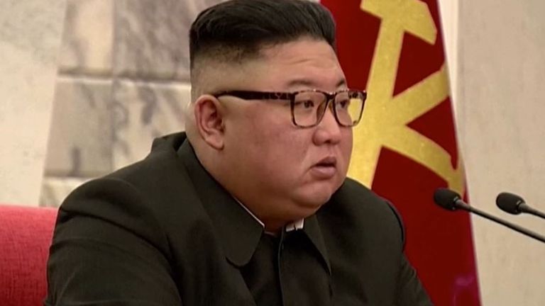 Kim Jong Un smokes while addressing generals
