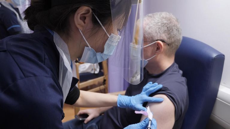 Julian Van Loxton gets a covid vaccine as part of a study