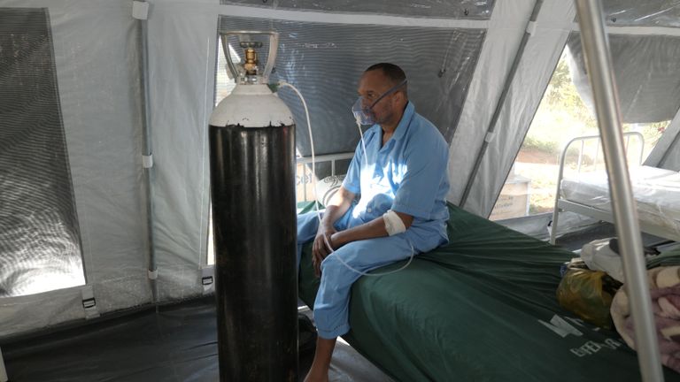 Patient Carlos Asan in COVID tent at Hospital Central in Maputo Mozambique. 