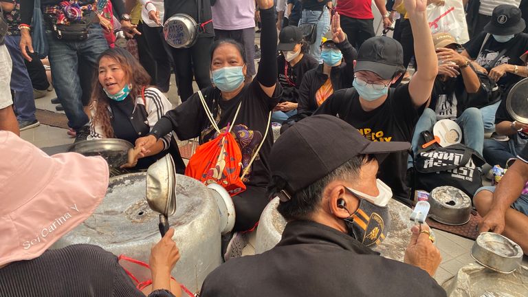 A makeshift orchestra was created from upturned cook wear and people were enthusiastically beating it as speakers shouted pro-democracy messages