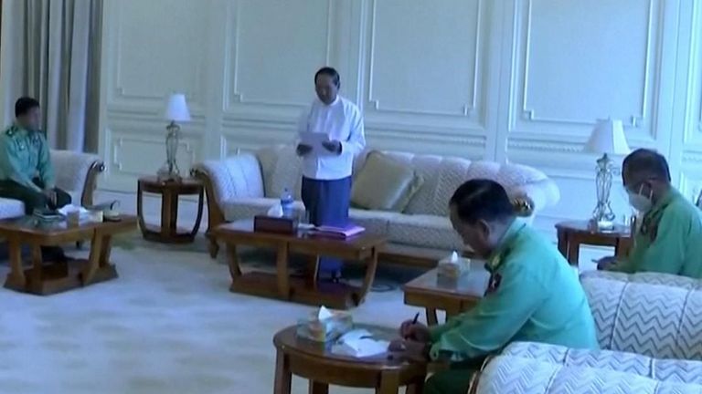 Myanmar&#39;s acting president, Myint Swe, reading a statement and meeting with the country&#39;s top military officers.