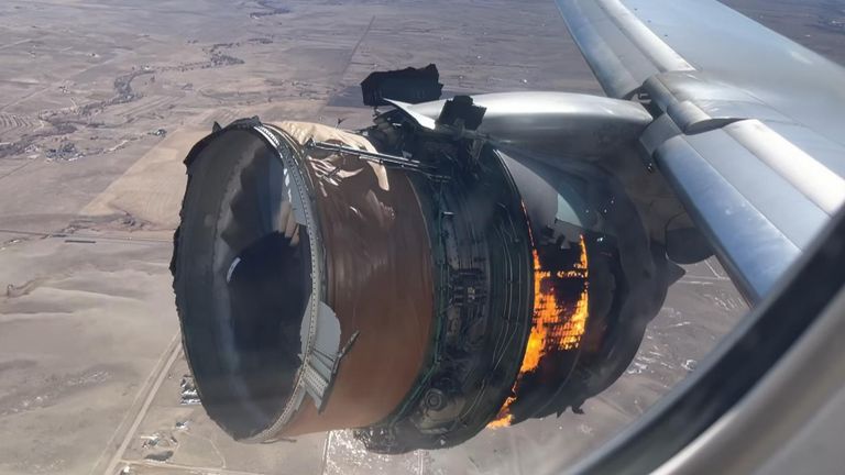 The engine of United Airlines Flight 328 is on fire after after experiencing &#34;a right-engine failure&#34; shortly after takeoff from Denver International Airport, Saturday, Feb. 20, 2021, in Denver, Colo. The Boeing 777 landed safely and none of the passengers or crew onboard were hurt. (Chad Schnell via AP)