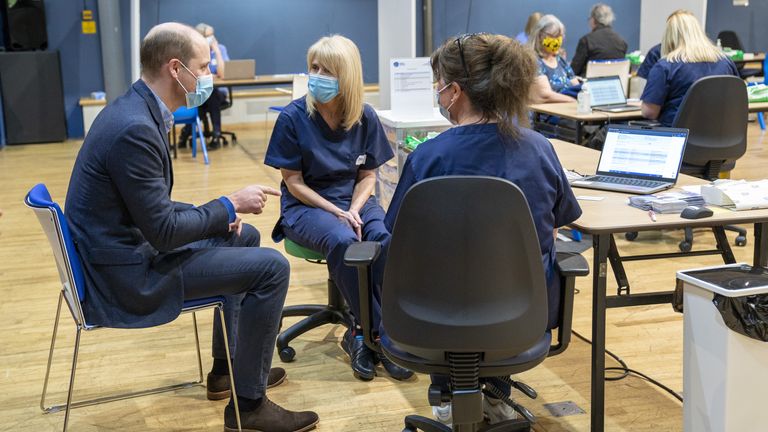 The Duke of Cambridge speaks to member of staff during his visit to the King&#39;s Lynn Corn Exchange Vaccination Centre in King&#39;s Lynn, Norfolk, where he paid tribute to the efforts of staff administering the Covid-19 vaccine. Picture date: Monday February 22, 2021.

