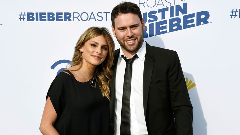 Braun - pictured with wife Yael Cohen in 2015 - manages acts including Justin Bieber