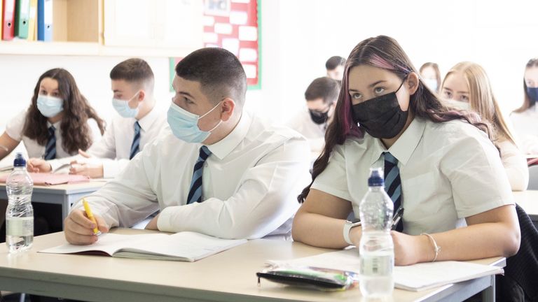 S5 and S6 pupils at St Columba&#39;s High School in Gourock, Inverclyde, wear protective face masks during their history lesson