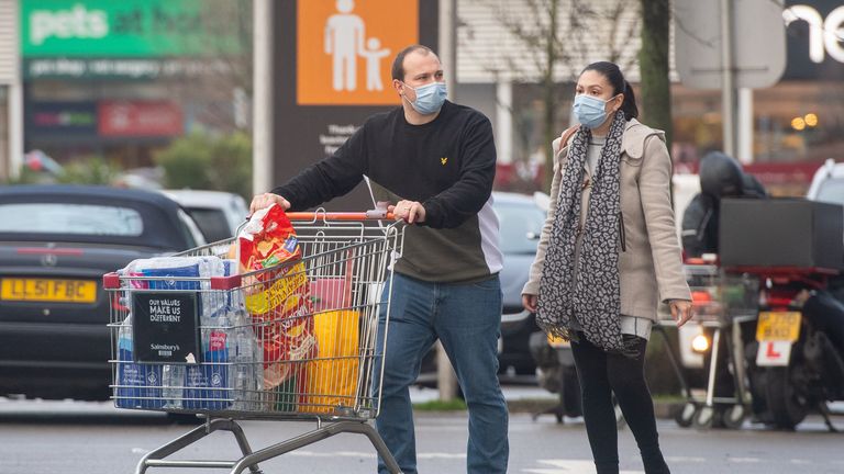 Shoppers wearing face masks 