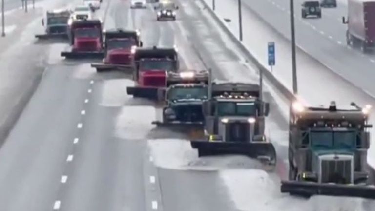 Snow ploughs work in synchronisation to clear roads in Kentucky