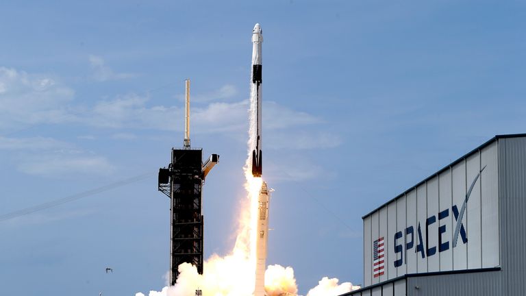 A SpaceX Falcon 9 carrying a Dragon capsule lifts off from the Kennedy Space Center in Florida in May 2020. Pic: AP