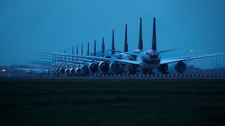 Thai Airways idle airplanes are seen parked on the tarmac of Suvarnabhumi Airport in Bangkok, Thailand May 25, 2020. REUTERS/Jorge Silva