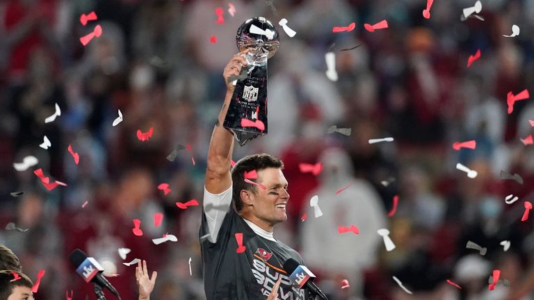 Tampa Bay Buccaneers quarterback Tom Brady holds up the Vince Lombardi trophy