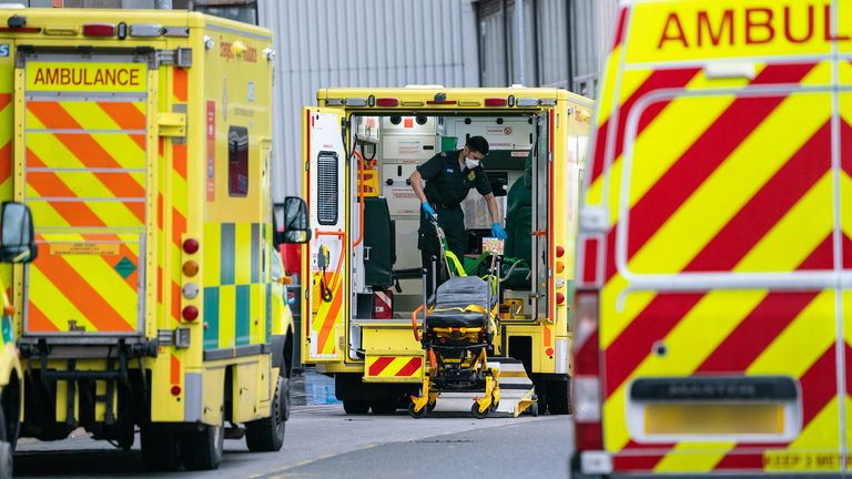 A paramedic at work in the rear of an ambulance outside the Royal London Hospital, in London, during England&#39;s third national lockdown to curb the spread of coronavirus. Picture date: Wednesday January 20, 2021.