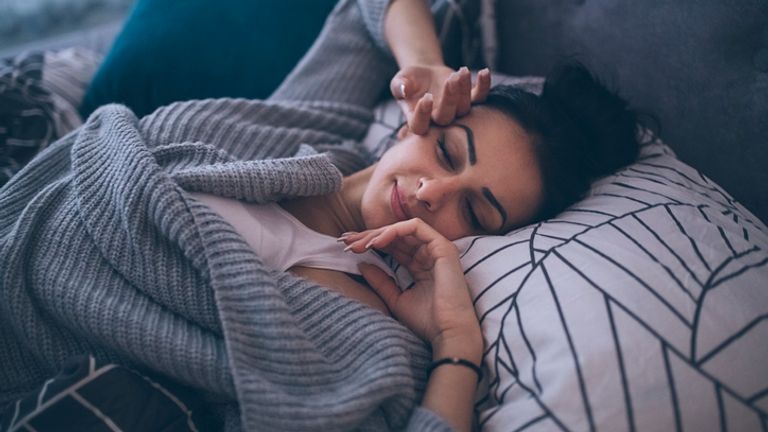 Young woman waking up