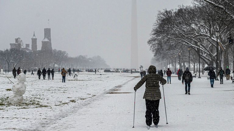 Someone skis towards the Washington Monument