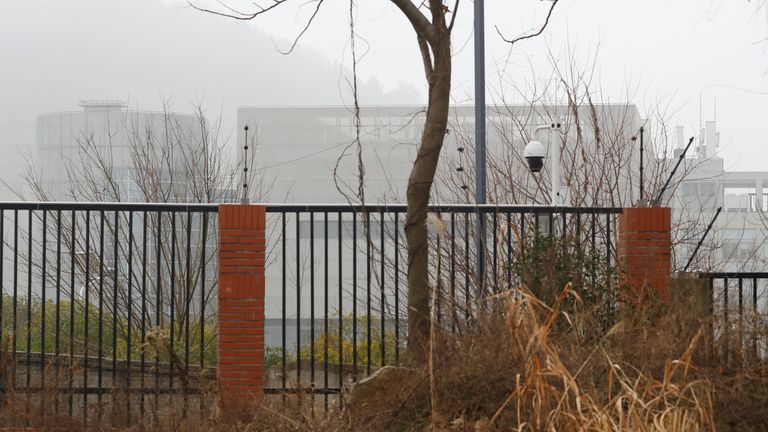 The P4 laboratory of Wuhan Institute of Virology is seen behind a fence during the visit by the World Health Organization (WHO) team tasked with investigating the origins of the coronavirus disease (COVID-19), in Wuhan, Hubei province, China February 3, 2021.