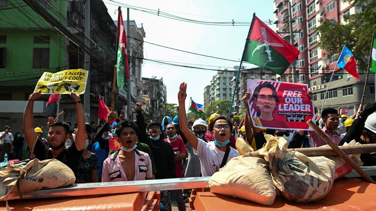 Protesters made the three-fingered salute in Yangon on Saturday