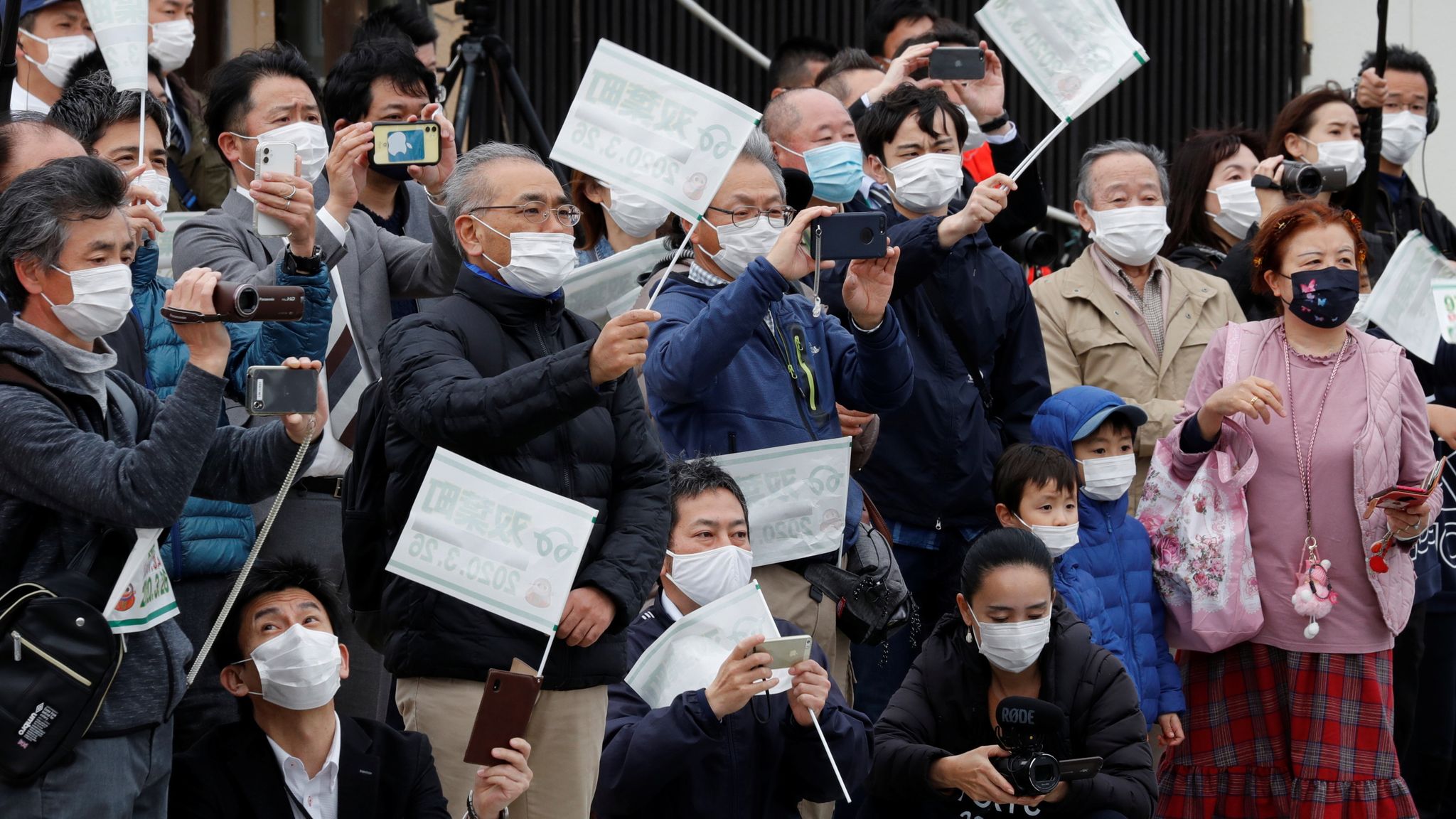 Tokyo Olympics: Claps and waves but no cheering as torch relay begins ...