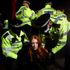 Met Police chief urged to resign after 'disgraceful' clashes between officers and crowds at Sarah Everard vigil