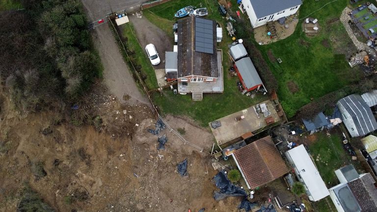 The home (top centre) of Edd Cane, on the cliff edge in Eastchurch, on the Isle of Sheppey, Kent, where residents continue to find a way to save their homes from plunging over the cliff edge. Picture date: Thursday March 4, 2021. Picture date: Thursday March 4, 2021.