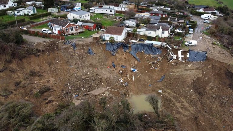 The home (left) of Edd Cane, on the cliff edge in Eastchurch, on the Isle of Sheppey, Kent, where residents continue to find a way to save their homes from plunging over the cliff edge. Picture date: Thursday March 4, 2021. Picture date: Thursday March 4, 2021.