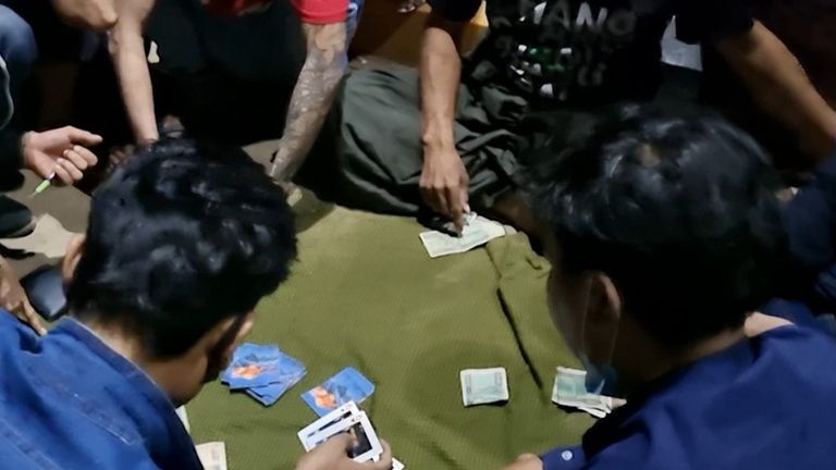 A card game was used to pass the time during curfew hours