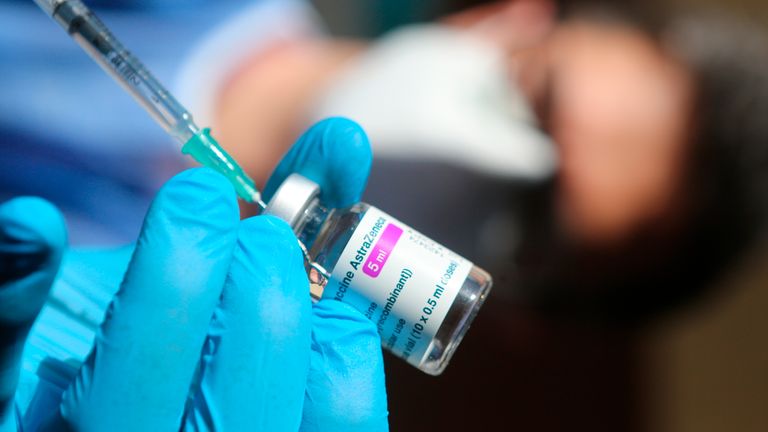 A syringe with the AstraZeneca vaccine is drawn up in Germany