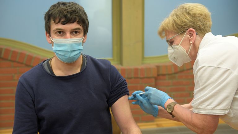 Teacher Rene Kirstein receives his first dose of AstraZeneca&#39;s COVID-19 vaccine in Grevesmuehlen, Germany