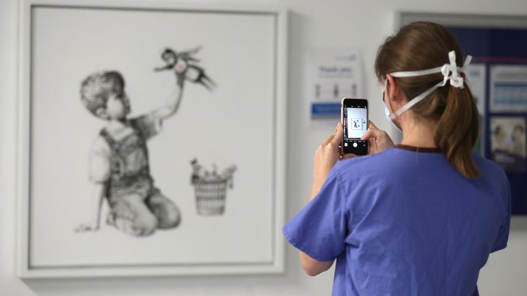 Banksy's hospital painting 'sells for record £16.8m' - raising money for  health charities | Ents & Arts News | Sky News