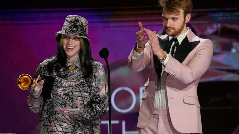 Billie Eilish accepts the award for record of the year alongside her brother, Finneas O&#39;Connell. Pic: AP 