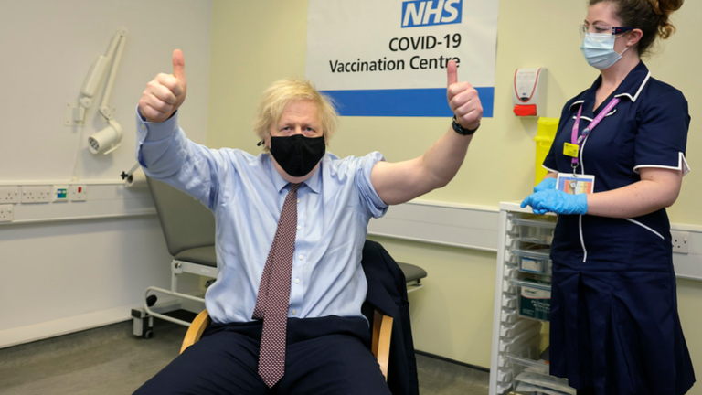 Boris Johnson gives a double thumbs-up after having the vaccine. Pic: No 10