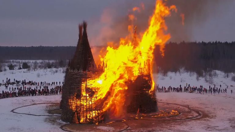 Castle structure symbolizing virus burned at festival