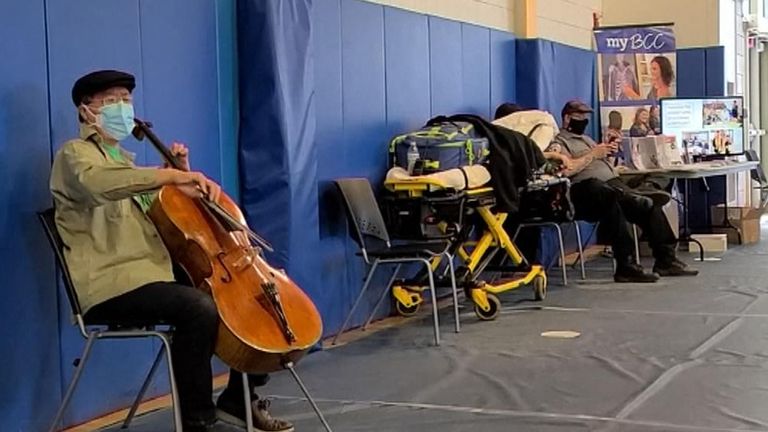 Vaccine recipients were treated to a mini concert when famed cellist Yo-Yo Ma brought out his instrument after getting his jab.