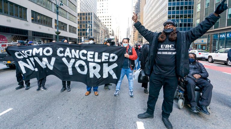 Activists have been demanding Andrew Cuomo&#39;s resignation  outside his office in New York. Pic: AP