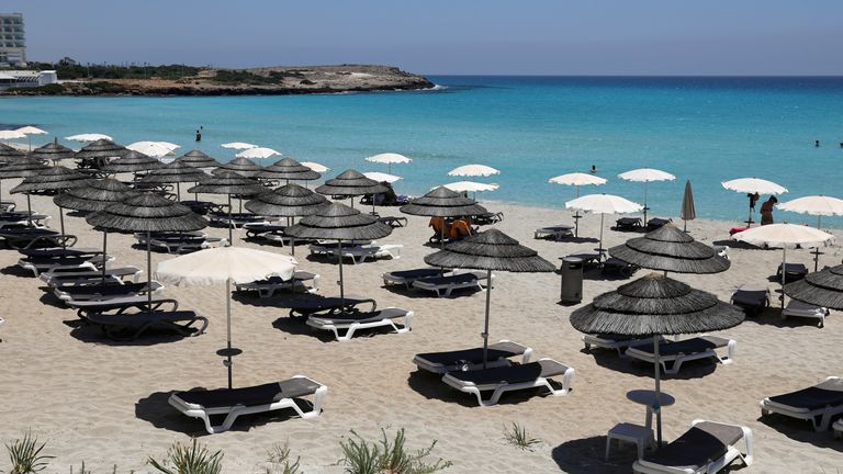 Empty sunbeds at Nissi Beach in Cyprus