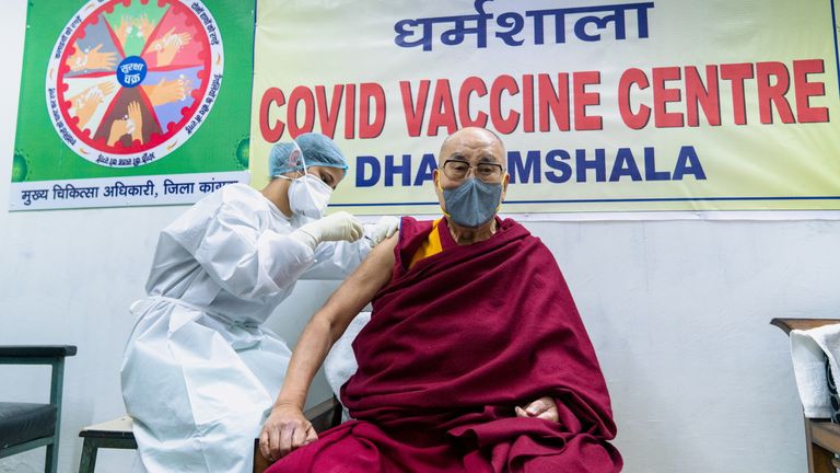 The Dalai Lama has been given his first jab at a hospital