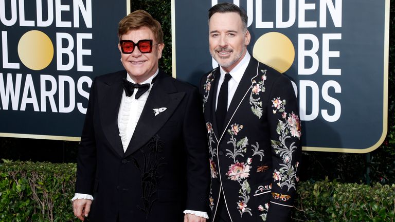 Elton John and David Furnish at the Golden Globes in 2020. Pic: AP